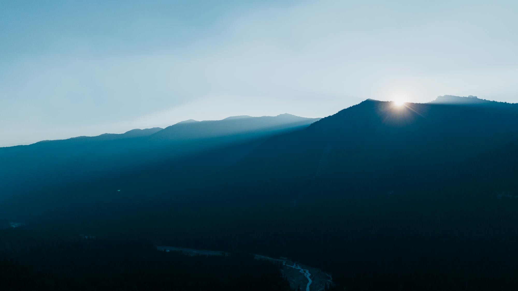 Misty Pacific coast mountains in British Columbia at dawn